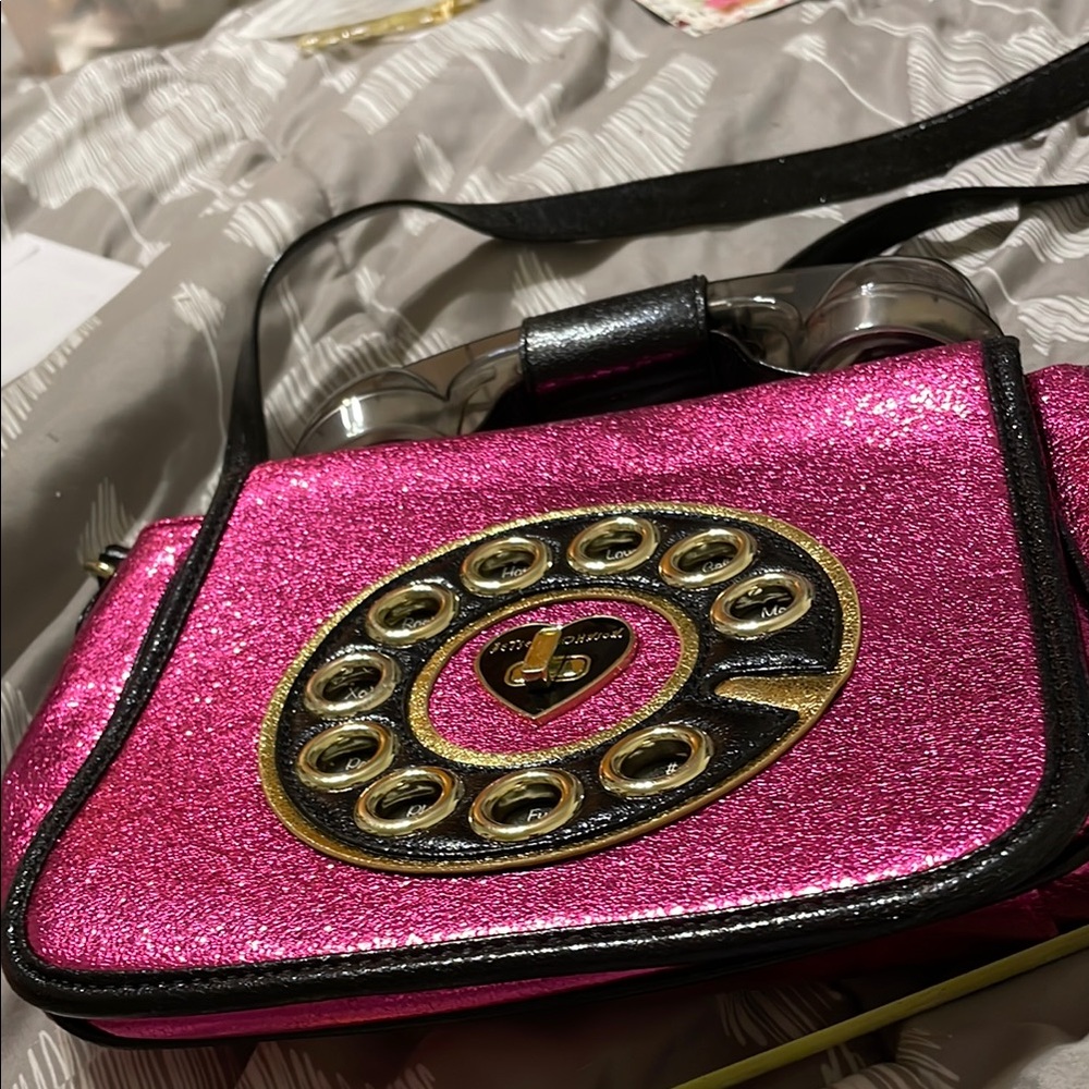 Pink and Black Crossbody Bag with Rotary Dial Design